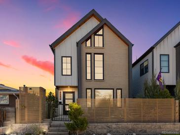 Stunning two-story modern home with stylish wood fence at 3348 Osage St, Denver, CO 80211