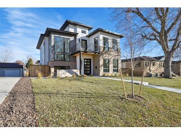 Modern two-story home with landscaped lawn and walkway at 2650 Zenobia, Denver, CO 80212