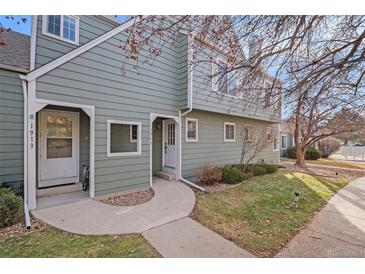Front walkway and entrance of a two-story condo at 1915 S Balsam St, Lakewood, CO 80227
