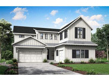 Two-story farmhouse with gray roof, white siding, and black shutters at 148 State St, Erie, CO 80516