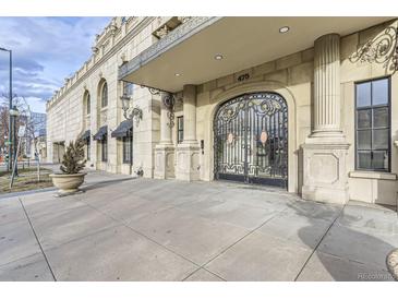 Building exterior with ornate gates and columns at 475 W 12Th Ave # 7G, Denver, CO 80204
