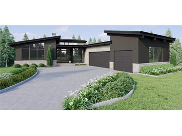 Modern home exterior with two car garage at 6194 Oxford Peak Ln, Castle Rock, CO 80108