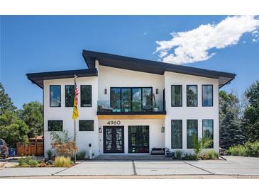 Stunning contemporary home with a sleek design and modern finishes at 4960 S Lipan Dr, Englewood, CO 80110