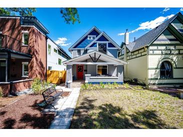 Charming craftsman home with gray exterior at 212 S Sherman St, Denver, CO 80209