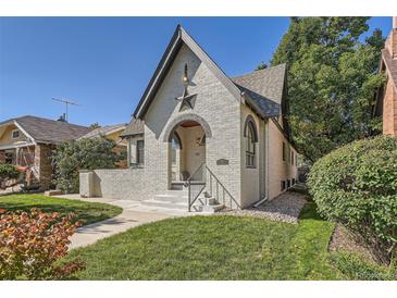 Charming one-story house with a star detail above the door at 665 S Gilpin St, Denver, CO 80209