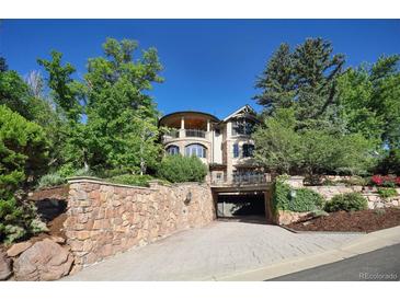 Stunning stone home with multi-car garage and a manicured landscape at 3015 3Rd St, Boulder, CO 80304