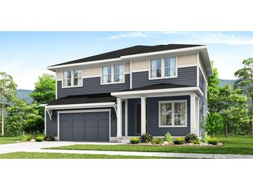 Two-story home with gray siding, white trim, and a two-car garage at 1826 Hickory Ave, Erie, CO 80516