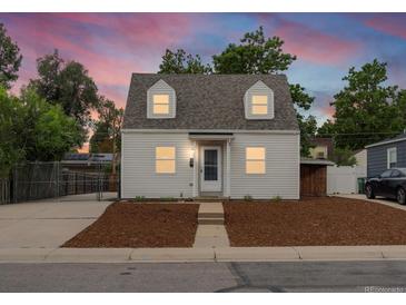 Charming cape cod home with a well-maintained front yard at 4835 Shoshone St, Denver, CO 80221