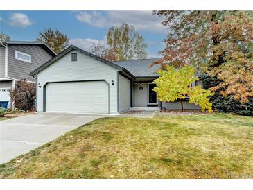 Charming single-story house with attached two-car garage at 251 S Carter Ave, Louisville, CO 80027