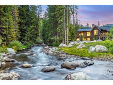Luxury home nestled on the banks of a scenic river at 378 River Park Dr, Breckenridge, CO 80424