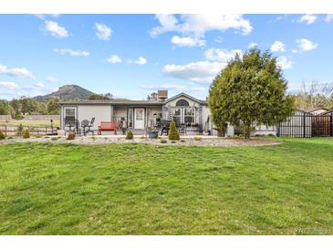 Photo one of 9449 Spruce Mountain Rd Larkspur CO 80118 | MLS 8955480
