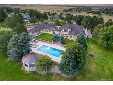 Luxury estate with pool and gazebo on 1.91 acres at 17575 E Kettle Pl, Centennial, CO 80016