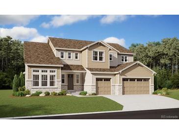 Two-story house with stone accents and a three-car garage at 5008 Hickory Oaks St, Castle Rock, CO 80104