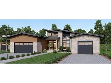 Modern two-story home with two-car garage and stone exterior at 8006 Trinity Peak Ln, Castle Rock, CO 80108