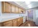 Bright kitchen with wood cabinets and updated appliances at 1448 W 102Nd Ave, Northglenn, CO 80260