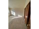 Well-lit bedroom with neutral carpeting and ample closet space at 3617 S Fundy Way, Aurora, CO 80013