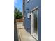 Rear exterior view showing private entrance and paved walkway at 3425 W 16Th Ave, Denver, CO 80204