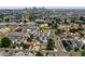 Aerial view of a house and neighborhood, showcasing the property's location and surrounding area at 3425 W 16Th Ave, Denver, CO 80204
