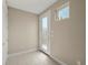 Main floor laundry room with door to backyard at 3425 W 16Th Ave, Denver, CO 80204