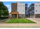 Modern townhouses with attached garages and front yard at 3425 W 16Th Ave, Denver, CO 80204