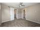Bright bedroom with carpet and access to hallway bathroom at 3425 W 16Th Ave, Denver, CO 80204