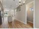 Open concept kitchen with island and hardwood floors at 3425 W 16Th Ave, Denver, CO 80204