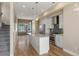 Modern kitchen with stainless steel appliances and island at 3425 W 16Th Ave, Denver, CO 80204