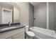 Full bathroom with tub, toilet and single vanity at 3425 W 16Th Ave, Denver, CO 80204