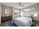 Spacious bedroom with carpet, large windows, and ceiling fan at 3425 W 16Th Ave, Denver, CO 80204
