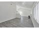 Bright and airy living room with gray vinyl flooring and high ceilings at 991 E 88Th Ave, Thornton, CO 80229