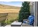 Private balcony features comfortable seating and stunning views at 10364 Carriage Club Dr, Lone Tree, CO 80124