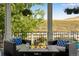 Covered patio features a fire pit and comfortable seating at 10364 Carriage Club Dr, Lone Tree, CO 80124