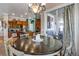 Kitchen breakfast nook features a round table and access to the backyard at 10364 Carriage Club Dr, Lone Tree, CO 80124