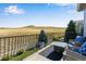 Relaxing balcony with outdoor furniture and scenic views at 10364 Carriage Club Dr, Lone Tree, CO 80124
