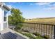 Spacious balcony overlooking a tranquil landscape at 10364 Carriage Club Dr, Lone Tree, CO 80124