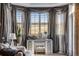 Bright vanity area with bay window and stylish furniture at 10364 Carriage Club Dr, Lone Tree, CO 80124