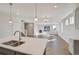 Kitchen island overlooking the living room and fireplace at 1815 Chaffee Crest Dr, Berthoud, CO 80513