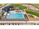 Community pool, playground, and clubhouse aerial view at 1815 Chaffee Crest Dr, Berthoud, CO 80513