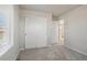 Bedroom with carpet flooring, large closet, and window with blinds at 21124 E 63Rd Dr, Aurora, CO 80019