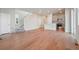 Open living room with hardwood floors and staircase at 21124 E 63Rd Dr, Aurora, CO 80019