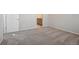 Bright bedroom with carpet flooring and access to bathroom at 21124 E 63Rd Dr, Aurora, CO 80019