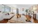 Light-filled living room featuring hardwood floors and modern furniture at 4109 S Acoma St, Englewood, CO 80110