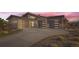 Modern home with a two-car garage and landscaped front yard at 11364 Birolli Pl, Littleton, CO 80125