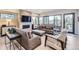 Comfortable living room with fireplace and access to backyard at 11364 Birolli Pl, Littleton, CO 80125