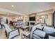 Comfortable living room with fireplace, sectional sofa, and ample seating at 11364 Birolli Pl, Littleton, CO 80125