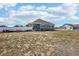 Large backyard with a view of the surrounding neighborhood at 9935 E 163Rd Pl, Brighton, CO 80602