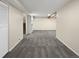 Spacious finished basement with gray carpeting at 2911 W Long Dr # D, Littleton, CO 80120