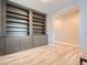 Built-in shelving and additional office space in library at 27431 E 10Th Dr, Aurora, CO 80018