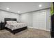 Basement bedroom with double doors and carpet at 54333 E County Road 26, Strasburg, CO 80136