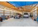 Interior view of the garage, showing space for two cars and storage at 54333 E County Road 26, Strasburg, CO 80136